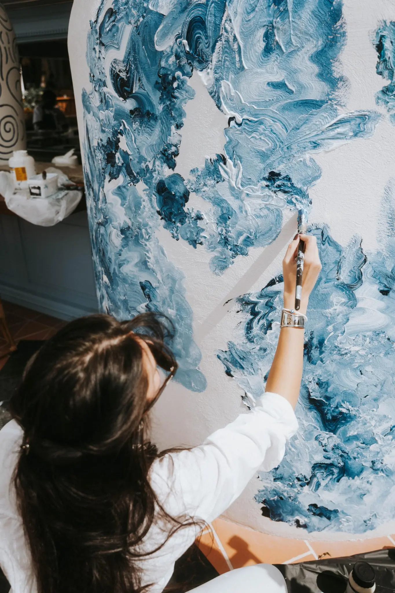 Tina Gavasheli creating the installation on site.